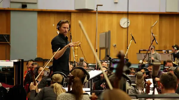 Brian Tyler conducting Brian Tyler is known for his work on Homem de Ferro 3 (2013), Thor: O Mundo Sombrio(2013) and Velozes & Furiosos 5: Operação Rio (2011).